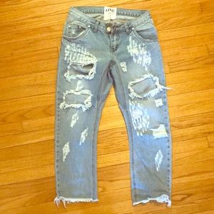 Distressed boyfriend jeans
